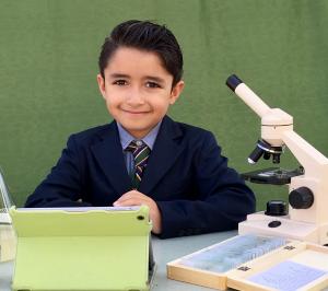 You boy dressed as a scientist