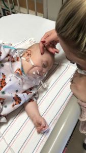 Sleeping toddler in hospital bed