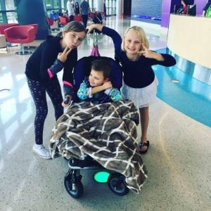 3 girls posing in hospital lobby