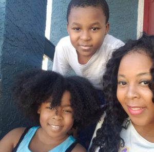 Selfie of mother, daughter and son