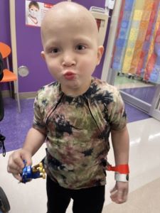 Boy in hospital treatment room