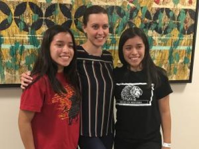 Twin teen girls posing with provider
