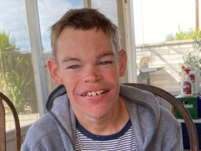 Teen smiling on back patio