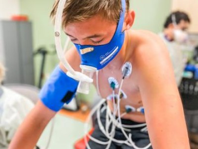 Boy wearing medical testing equipment