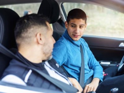 Teen driver with father in passenger seat