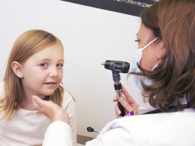 Girl getting her eyes checked