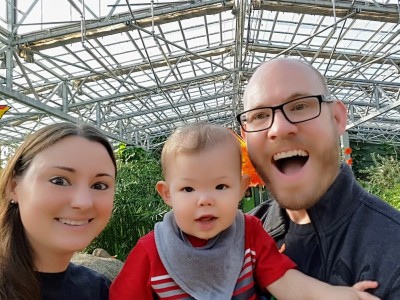 Family of 3 in garden center