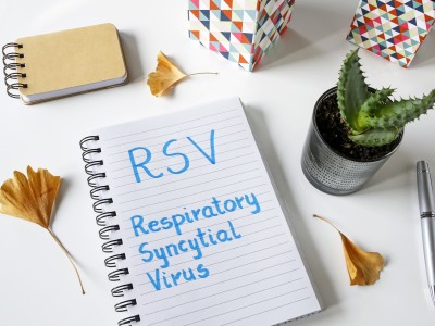 Notebook with RSV written on it