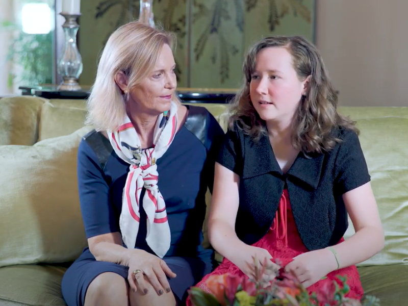 Mother and daughter on couch