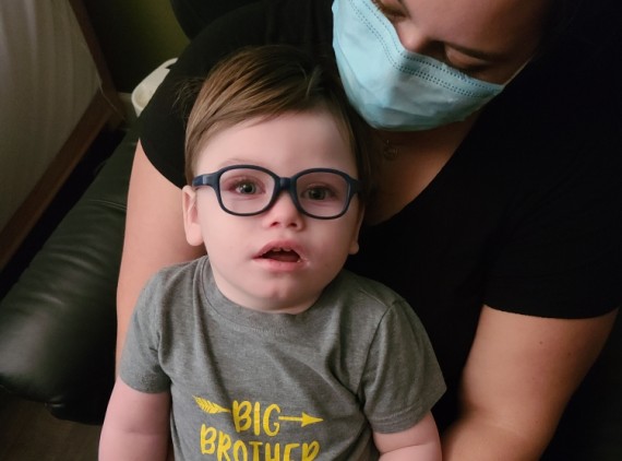 Toddler wearing glasses