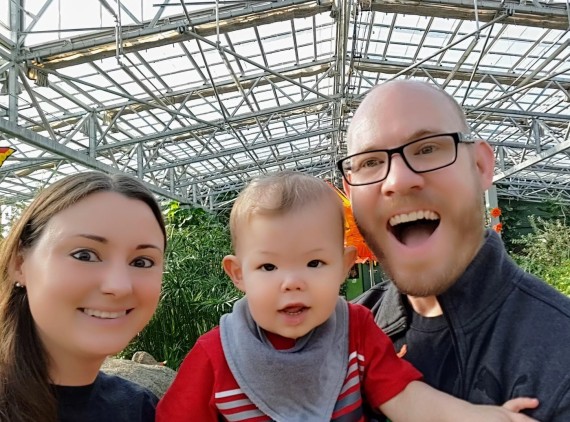 Family of 3 in garden center