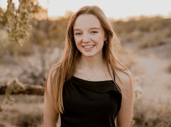 Teen girl posing in desert