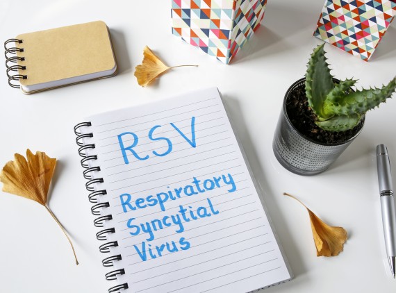 Notebook with RSV written on it