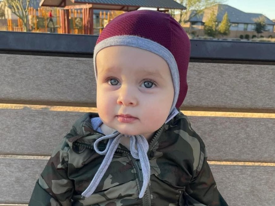 Toddler sitting on bench