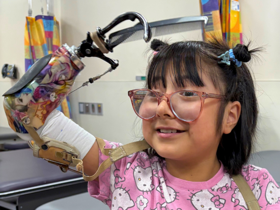 Girl smiling during occupational therapy