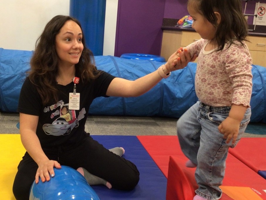 Occupational therapist and girl in occupational therapy